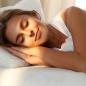 Preview: Eine Frau die im Bett ruhig schläft mit heller rustikalen Hintergrund